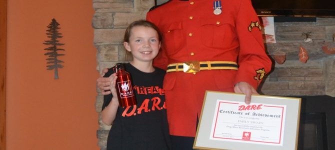 D.A.R.E. Officer Sgt. Swain with his daughter